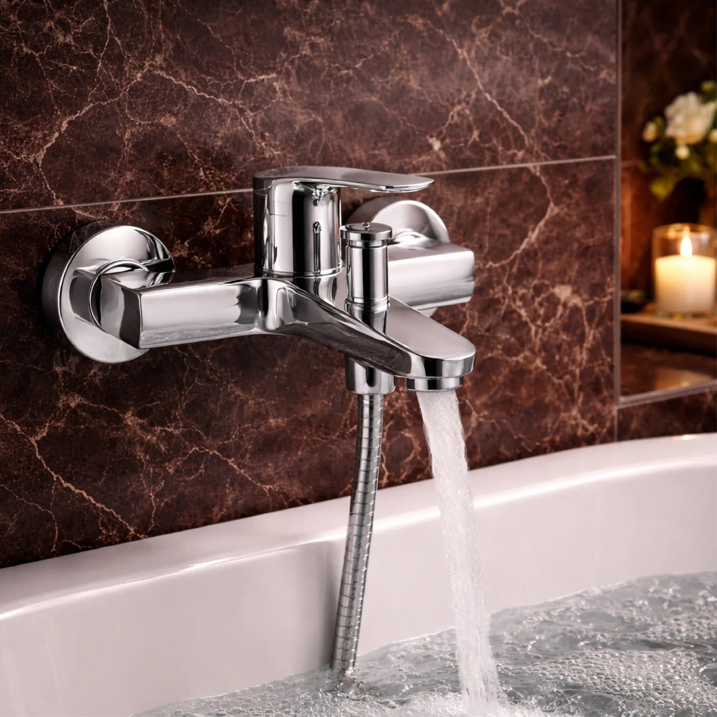 Sanitar COB-BM wall-mounted brass bath mixer with a polished chrome finish, featuring a sleek modern design with dual-handle controls and a central diverter.