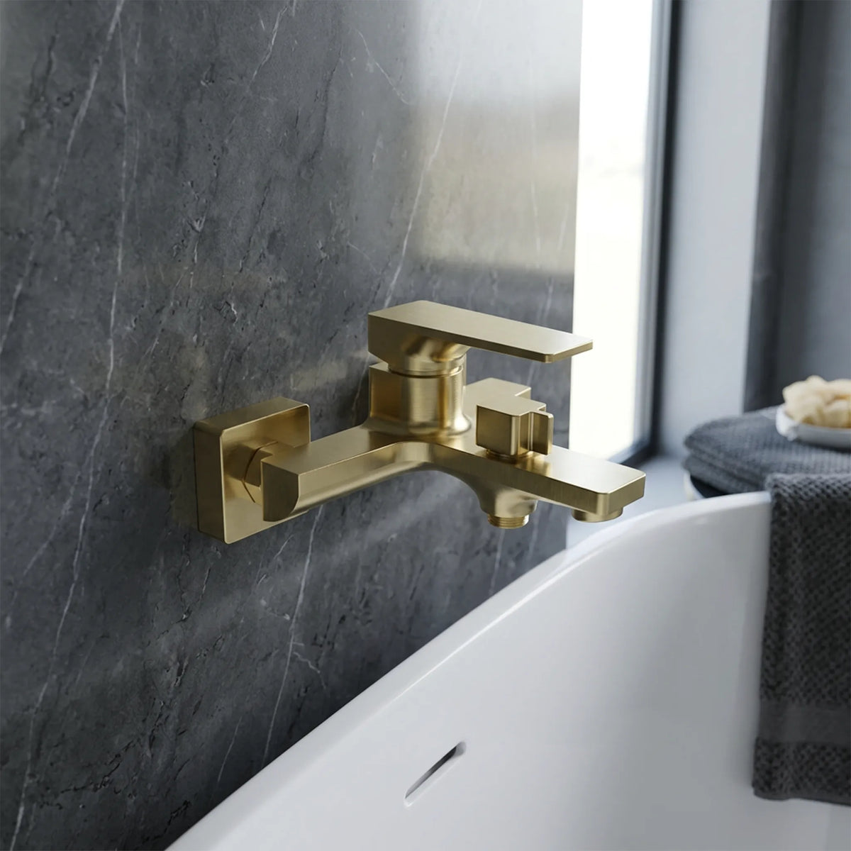 Sanitar CASE-BM BGD wall-mounted bath mixer featuring a luxurious brushed gold finish, a modern single-lever handle, a square diverter, and a flat spout.