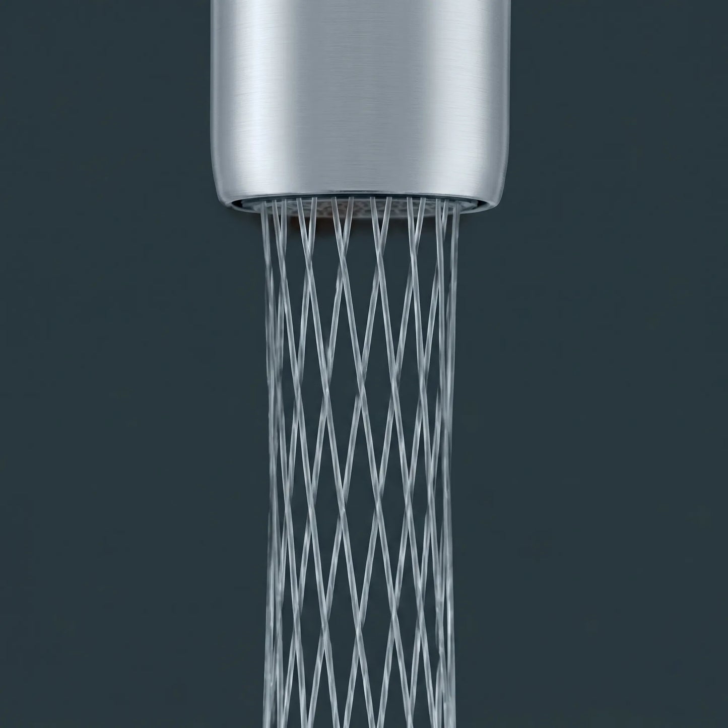 Close-up of a bathroom faucet with the Kludi Rak Mikado Due aerator installed, demonstrating the distinctive decorative diamond-grid water stream at a water-saving flow rate of 1.4 liters per minute.