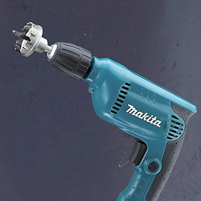 Makita 450W electric drill fitted with a metal hole saw bit for precision cutting.