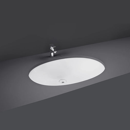 A top-down studio view of the RAK-Rosa 50cm Under Counter Wash Basin in Alpine White, showing its smooth oval basin interior and integrated overflow hole.