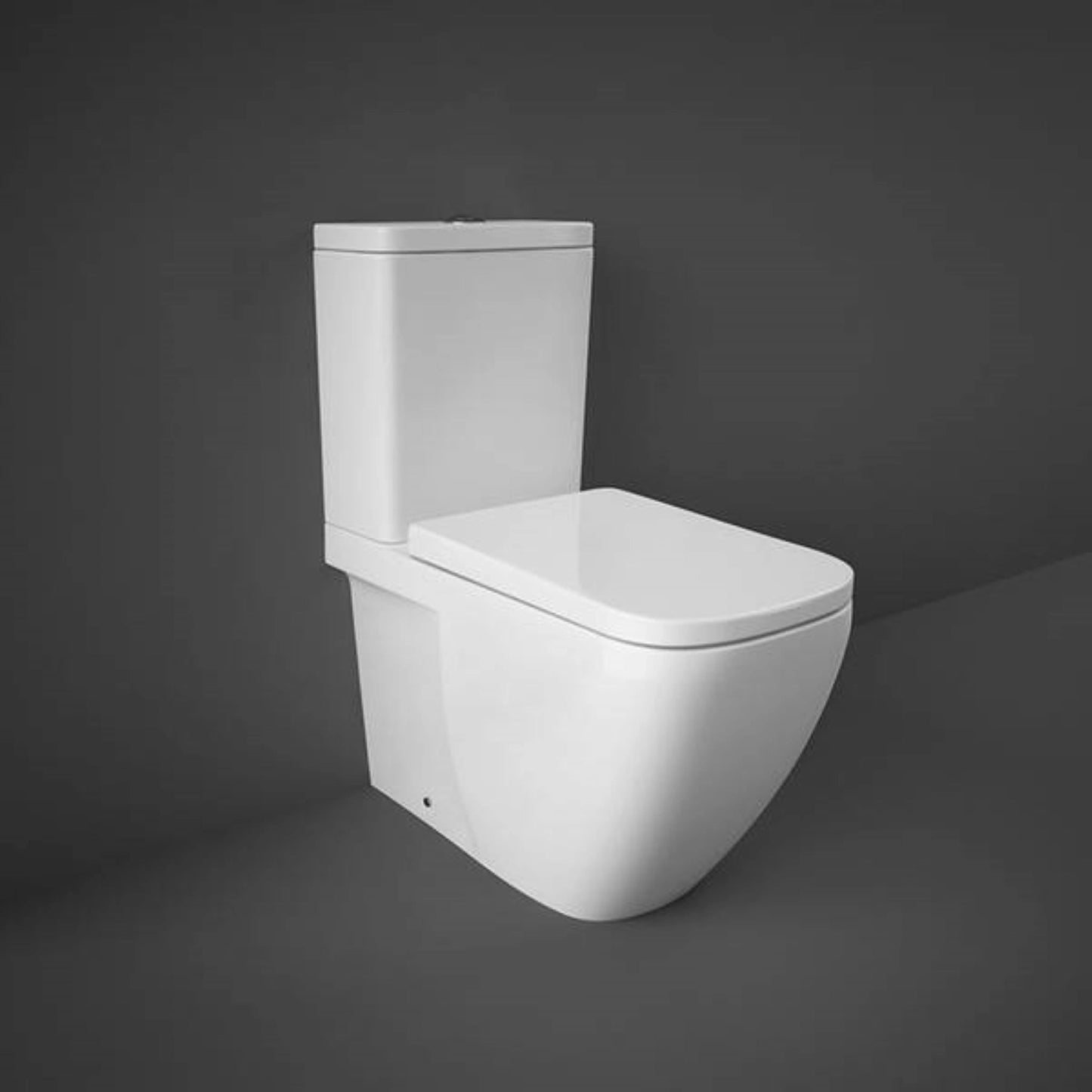 RAK Ceramics Caroline close coupled back-to-wall toilet pan in Alpine White (CY11AWHA) featuring a sleek rounded rectangle bowl and concealed trapway.