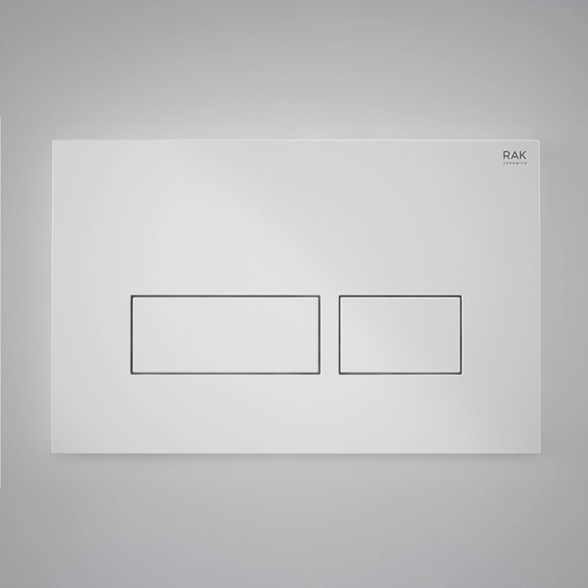 RAK Ceramics RAK-Ecofix rectangular dual-flush push plate in a glossy white finish with chrome-accented buttons.