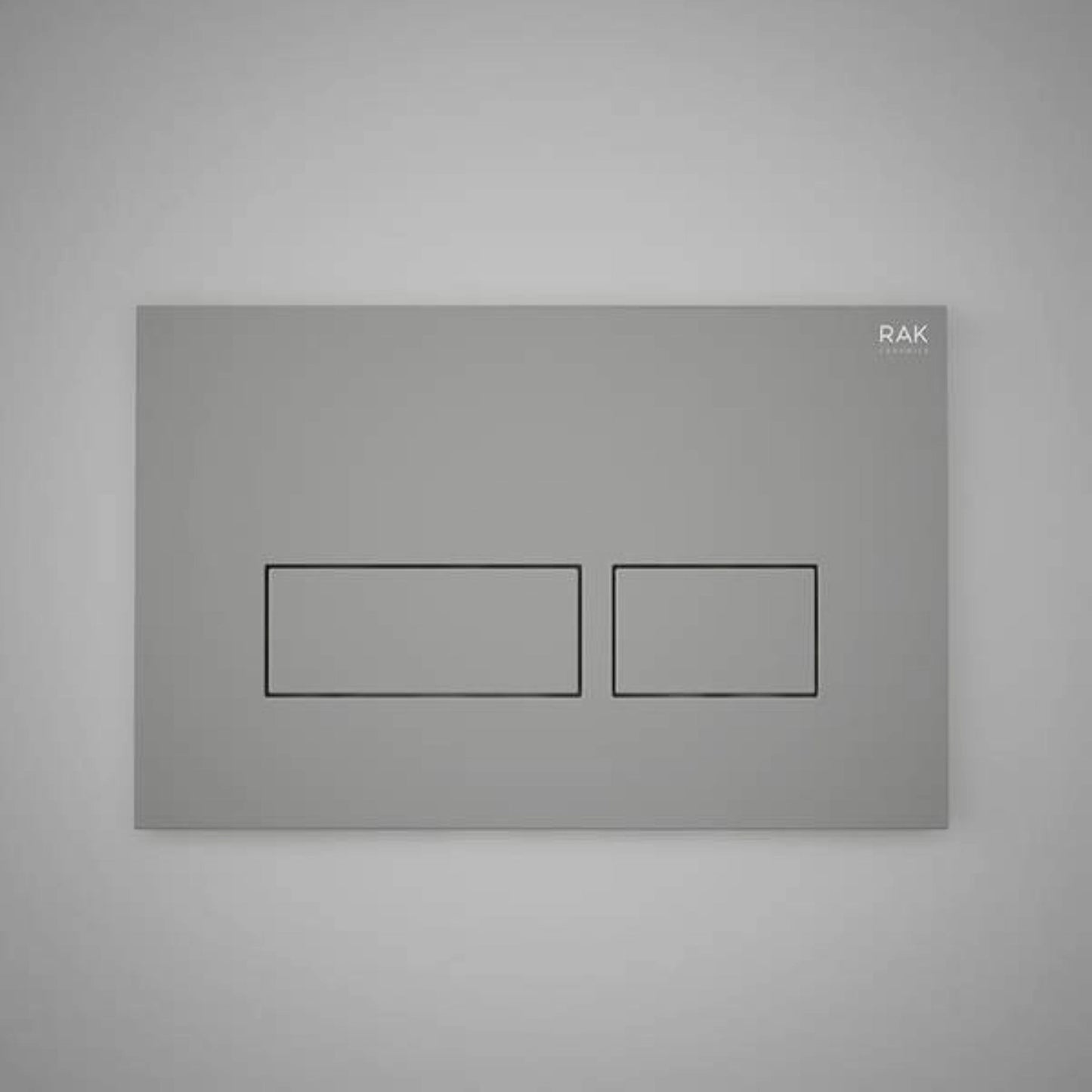 Front view of the RAK Ecofix rectangular dual flush plate in a contemporary Matt Grey finish, featuring two rectangular push buttons.