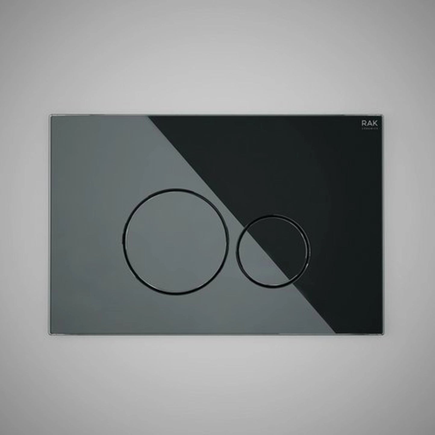 RAK Ceramics Ecofix luxury dual flush plate (FSRAKPPL010) featuring two circular buttons on a sleek, reflective black tempered glass rectangular panel.