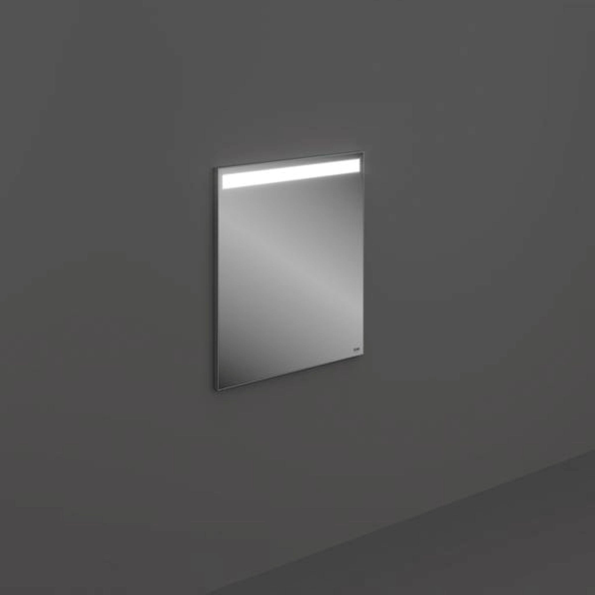 RAK Ceramics Joy 60cm rectangular bathroom mirror with vertical LED light strips on the sides and a slim 32mm profile.