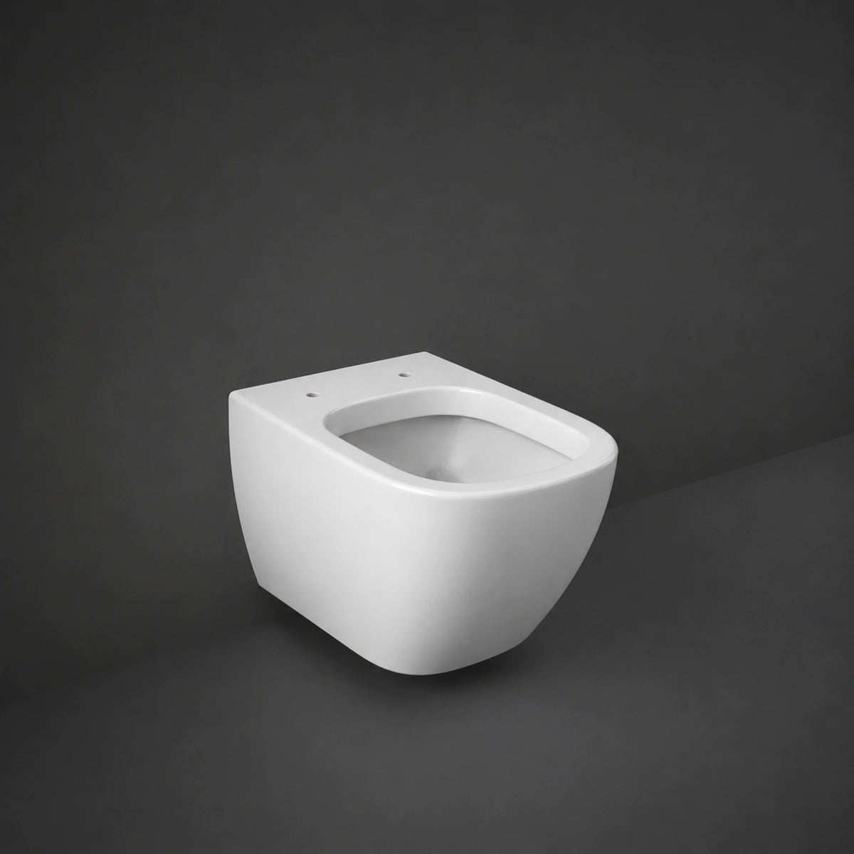 RAK Ceramics Metropolitan wall-hung water closet in Ivory finish (MP12IVA), showcasing its sleek rounded rectangle design and floating installation.