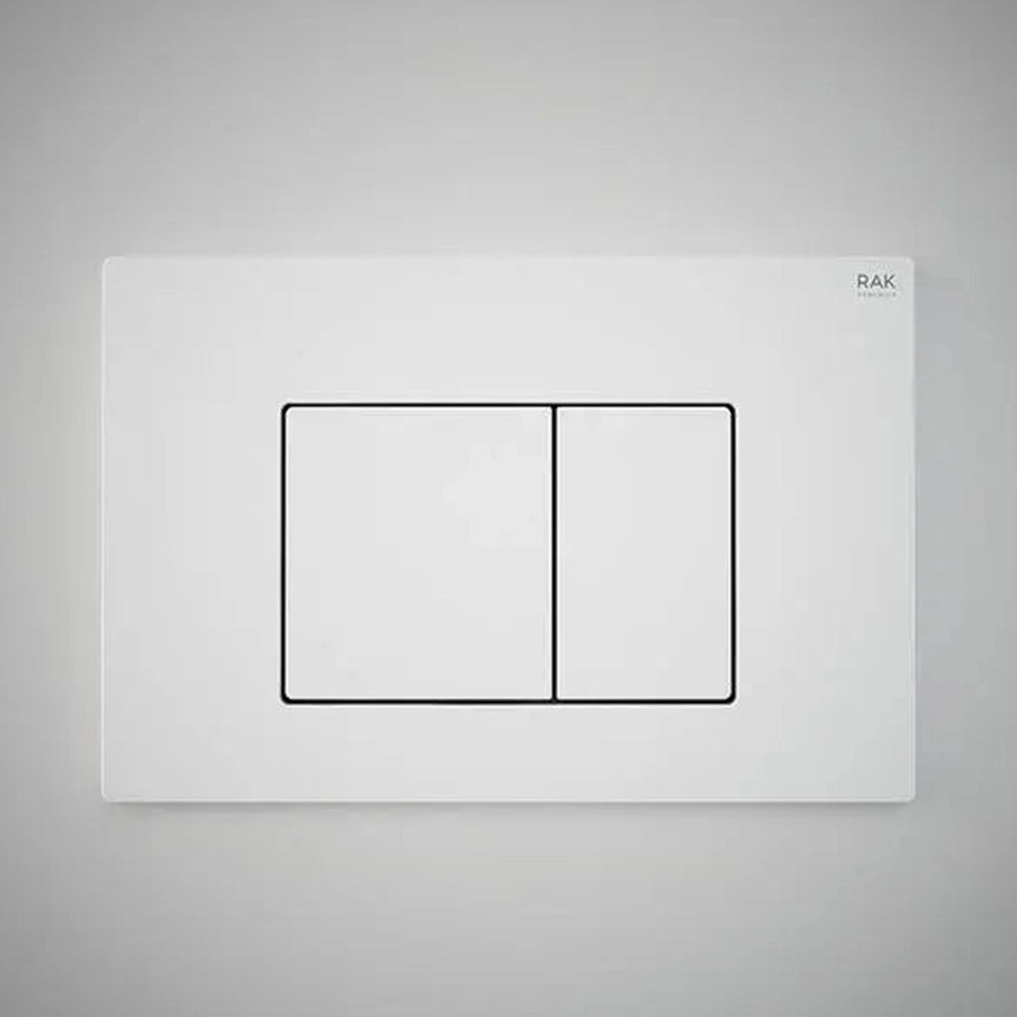 RAK Ceramics Neofix rectangular dual flush push plate in Matt White (NEOFSRAKPPL16) featuring two geometric buttons and a smooth, non-reflective finish.