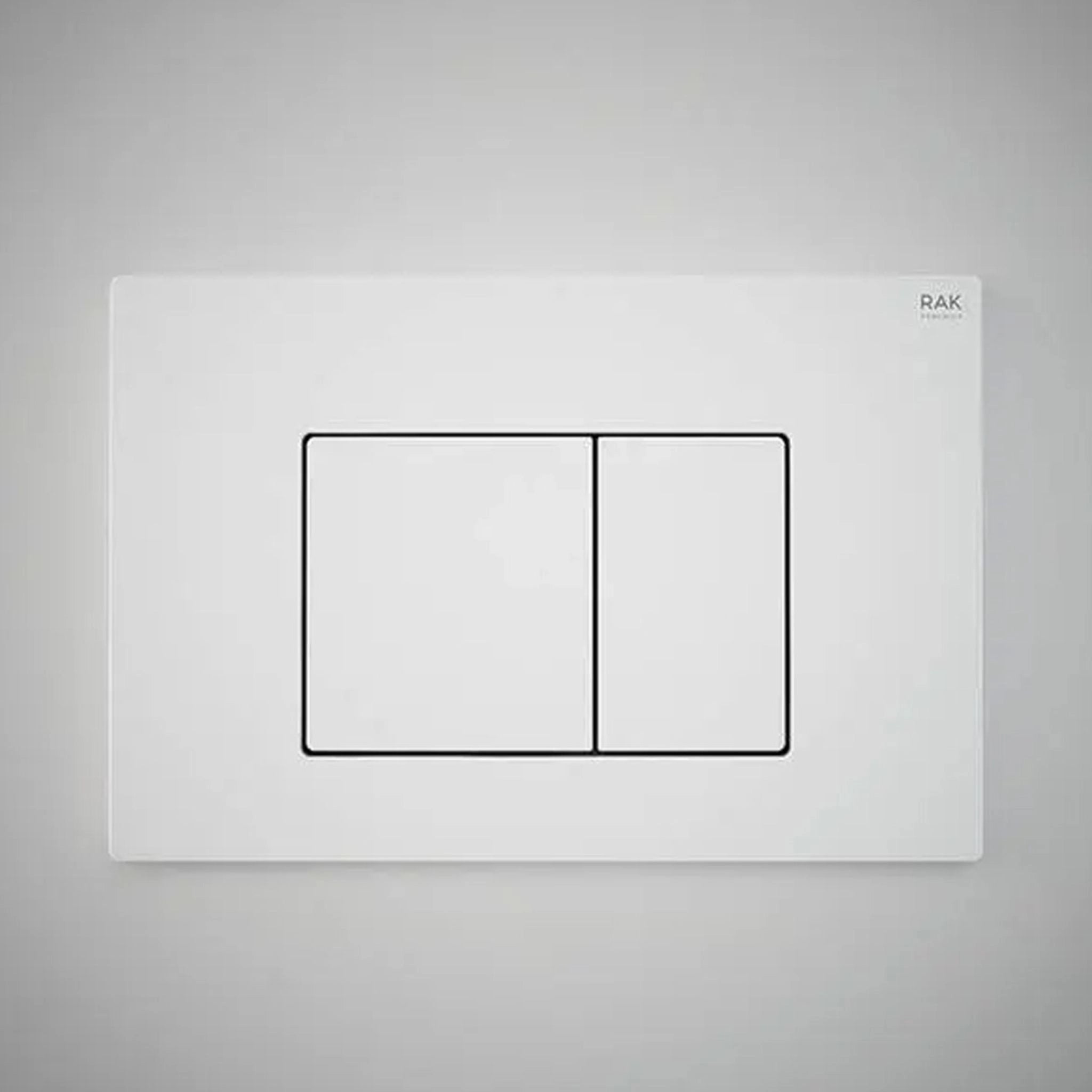 RAK Ceramics Neofix rectangular dual flush push plate in Matt White (NEOFSRAKPPL16) featuring two geometric buttons and a smooth, non-reflective finish.