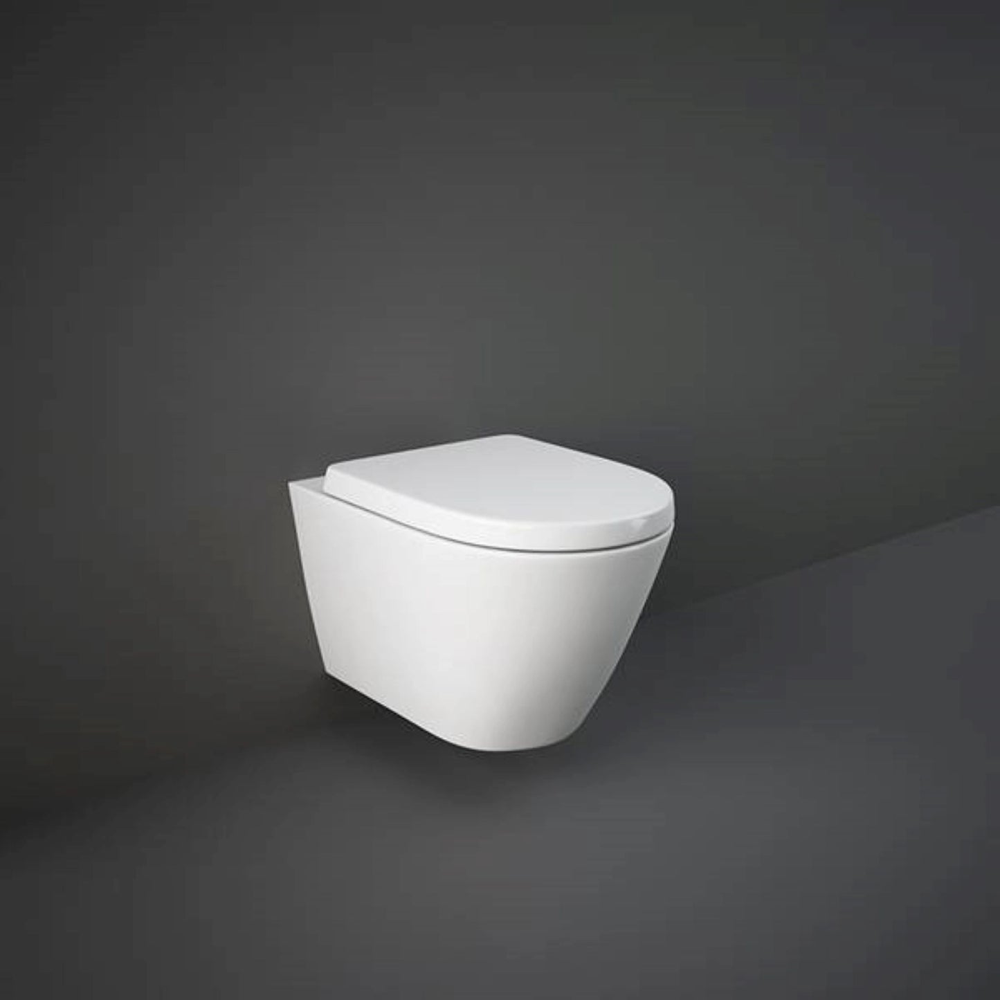 RAK-Resort RST23AWHA rimless wall hung water closet pan in Alpine White with a 52cm projection and hidden fixing system.