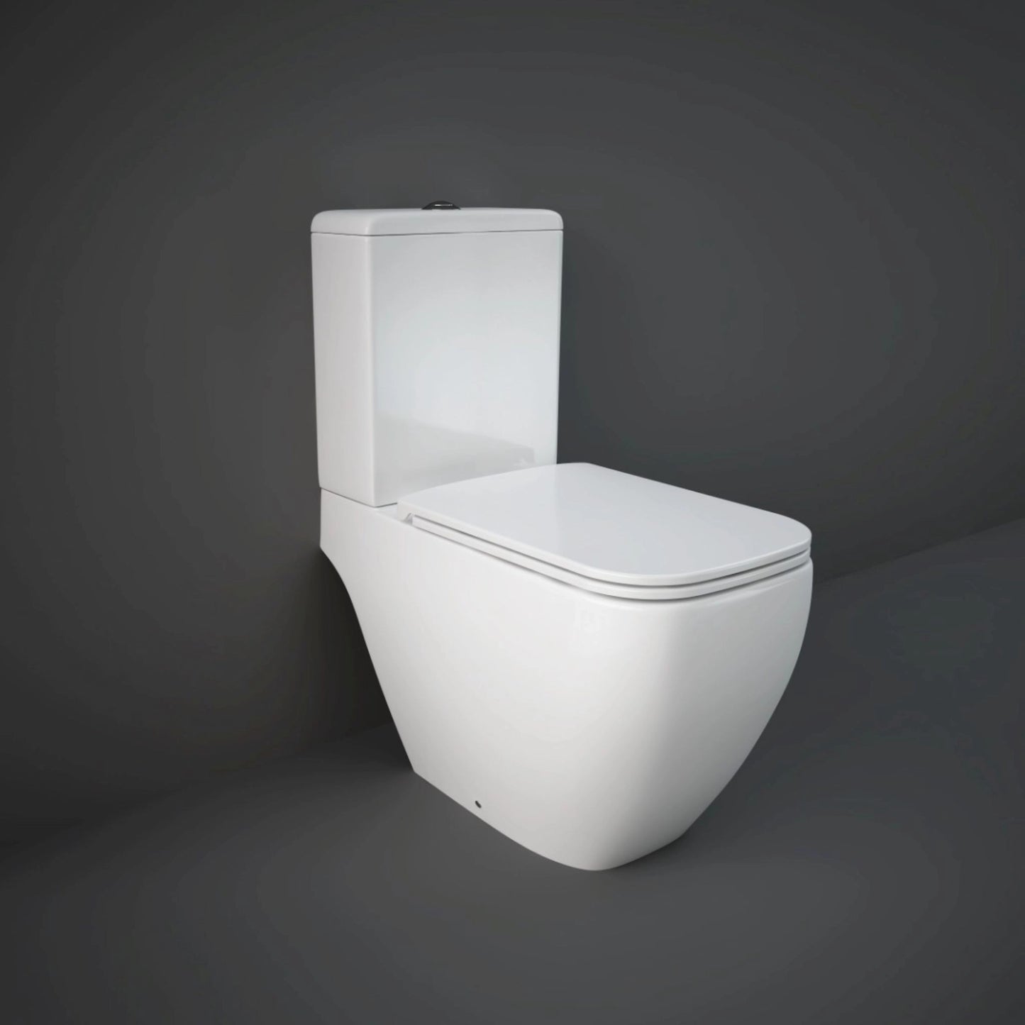 A grey space showcasing the RAK Ceramics Metropolitan toilet seat installed, emphasizing its clean, refined aesthetic and matte finish.