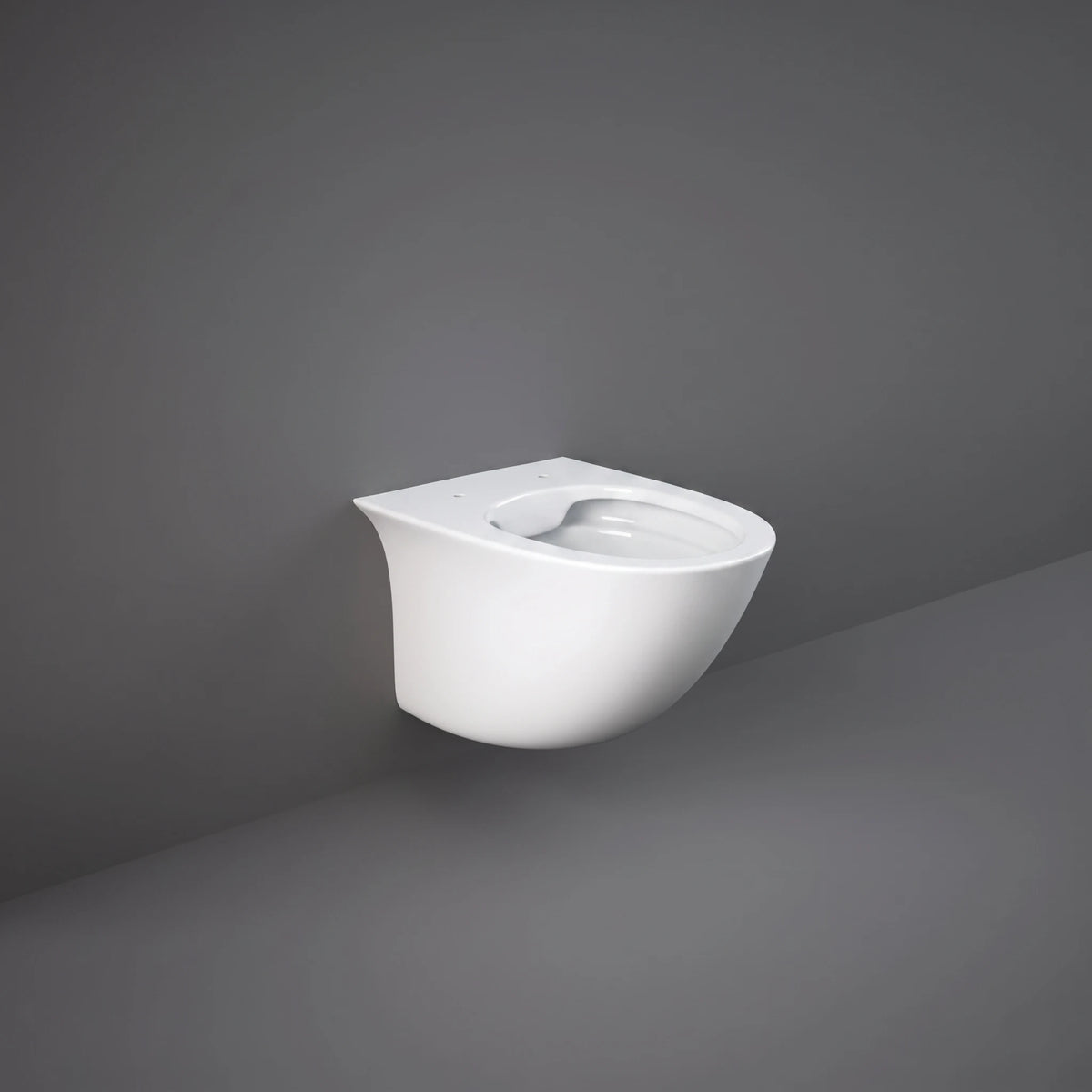 RAK-Sensation SENWC1446AWHA rimless wall hung water closet pan in Alpine White with hidden fixations and 520mm oval design.