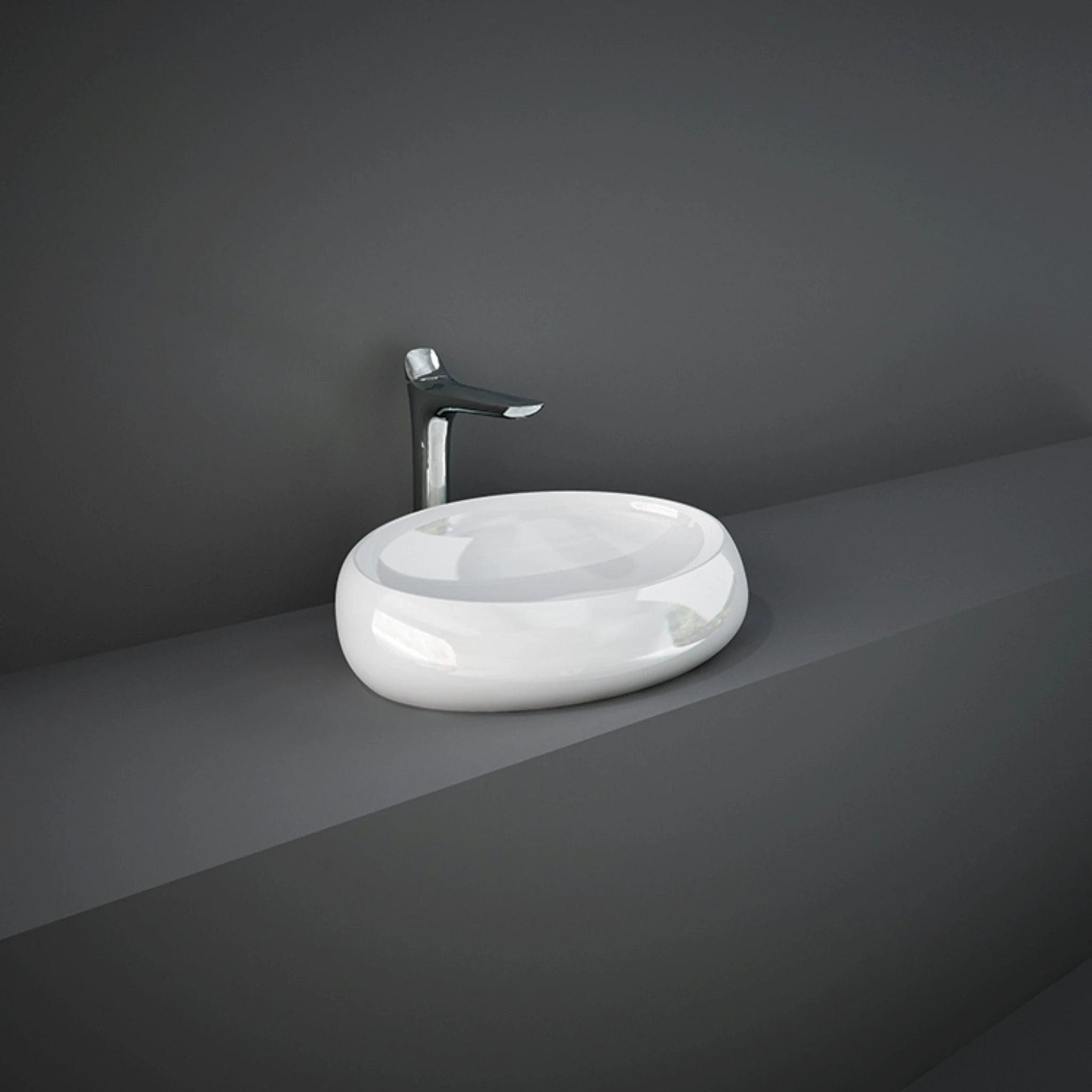 RAK-CLOUD CLOCT6000AWHA oval counter top washbasin in Alpine White ceramic, showing smooth organic curves.