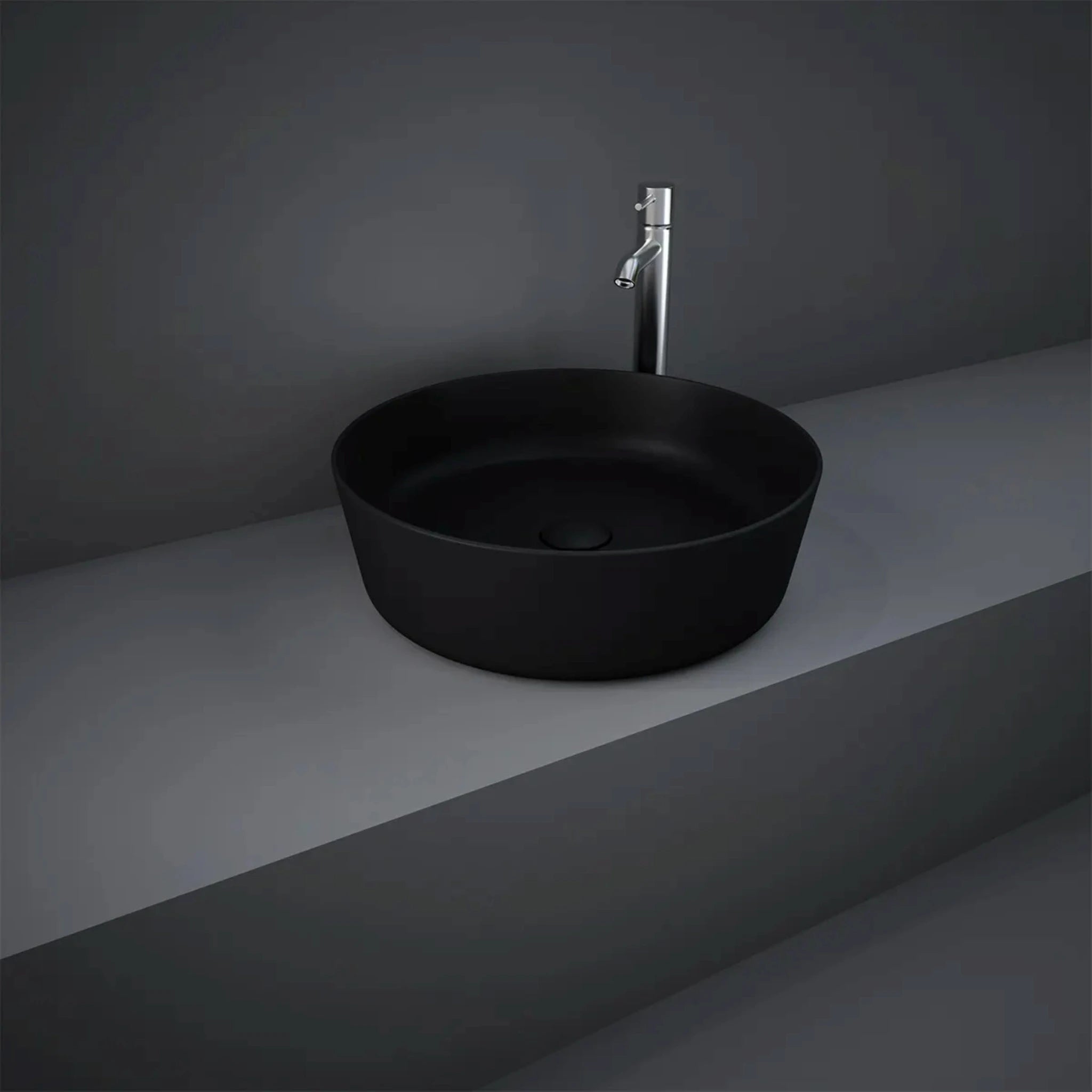 RAK-Feeling 42cm round countertop wash basin in a smooth Matt Black finish, highlighting its slim-rim design and modern spherical silhouette.