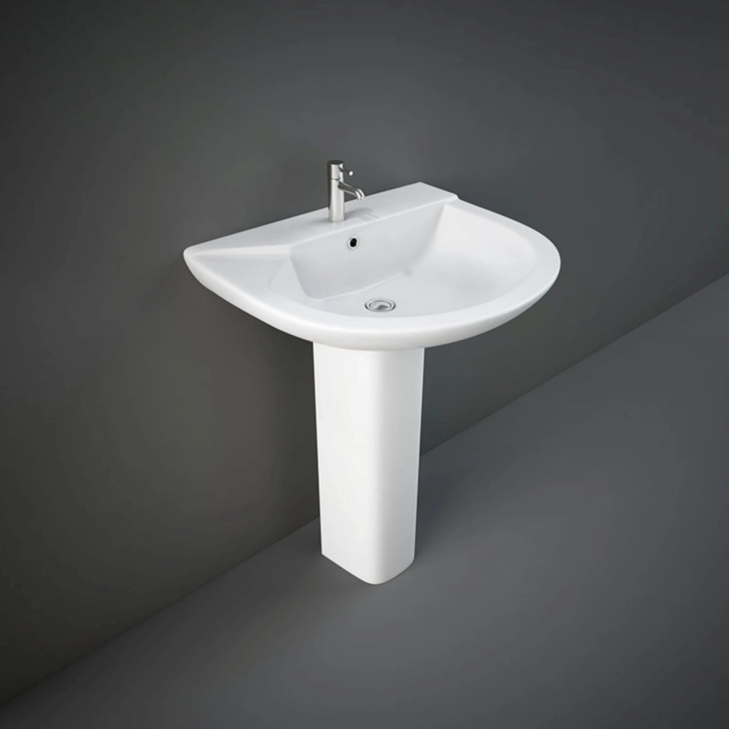 Front view of the 63cm RAK Ceramics Liwa round wash basin finished in classic Ivory, beautifully integrated with its matching floor-standing full ceramic pedestal.
