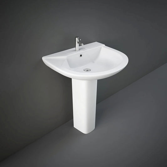 Front view of the 63cm RAK Ceramics Liwa round wash basin finished in classic Ivory, beautifully integrated with its matching floor-standing full ceramic pedestal.