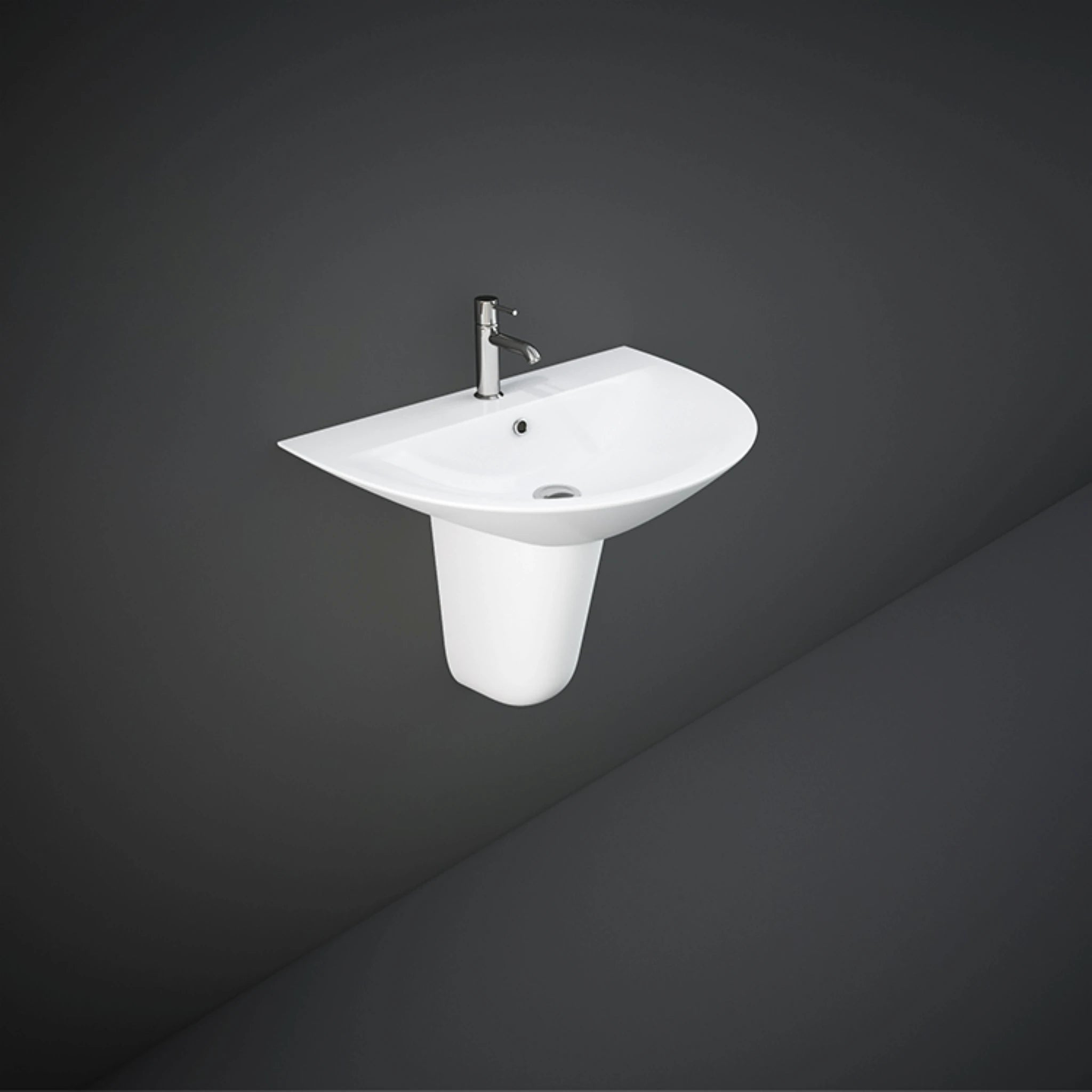 Front view of the 65cm RAK Ceramics Morning oval wash basin in Alpine White, flawlessly supported by its matching wall-mounted ceramic half pedestal.