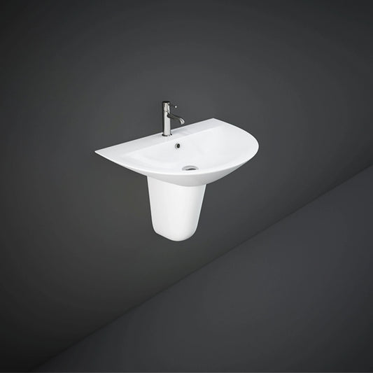 Front view of the 65cm RAK Ceramics Morning oval wash basin in Alpine White, flawlessly supported by its matching wall-mounted ceramic half pedestal.