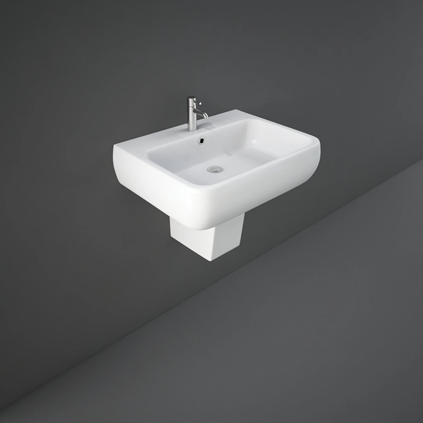 RAK Metropolitan 60cm alpine white wash basin paired with a sleek matching semi-pedestal shroud.