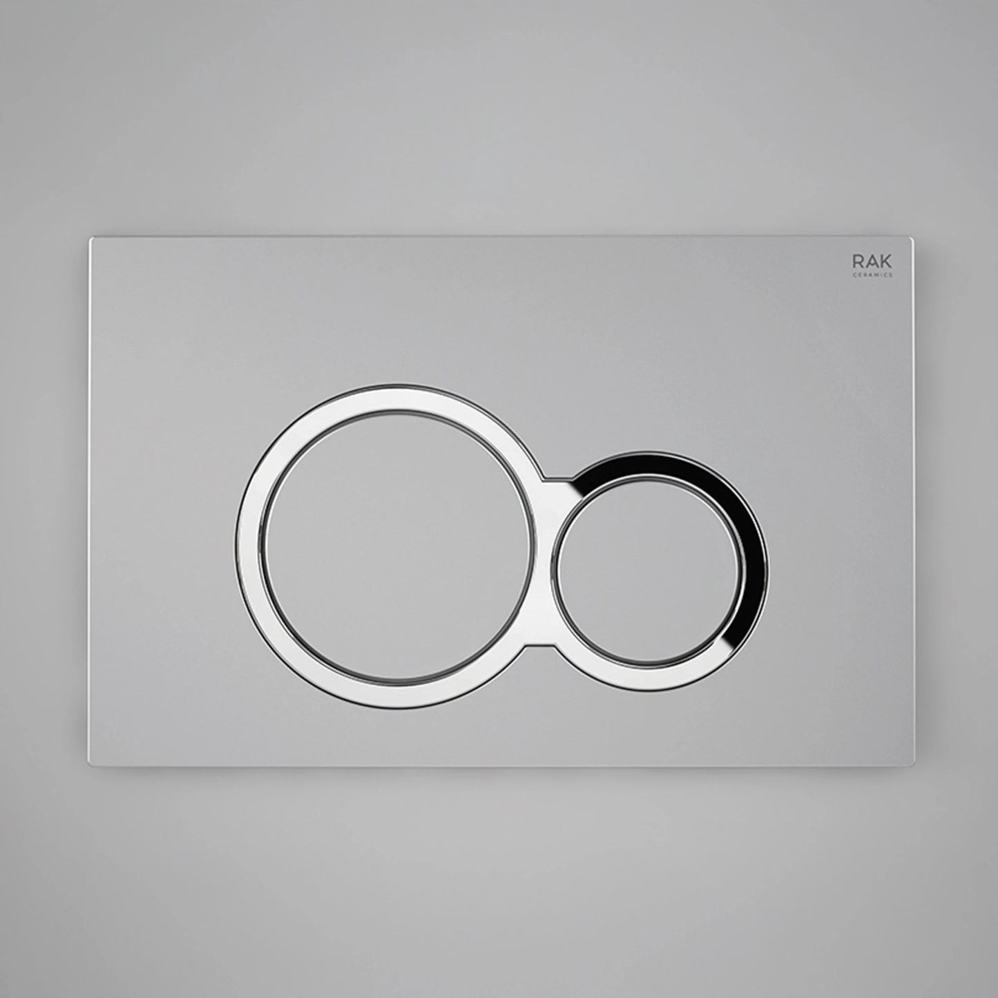 RAK Ceramics RAK-Ecofix rectangular push plate in a sophisticated Matt Chrome finish, featuring two circular dual-flush buttons.