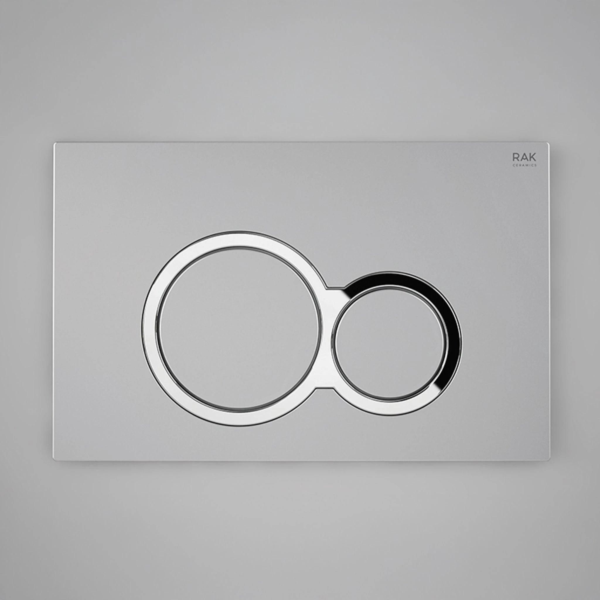 RAK Ceramics RAK-Ecofix rectangular push plate in a sophisticated Matt Chrome finish, featuring two circular dual-flush buttons.