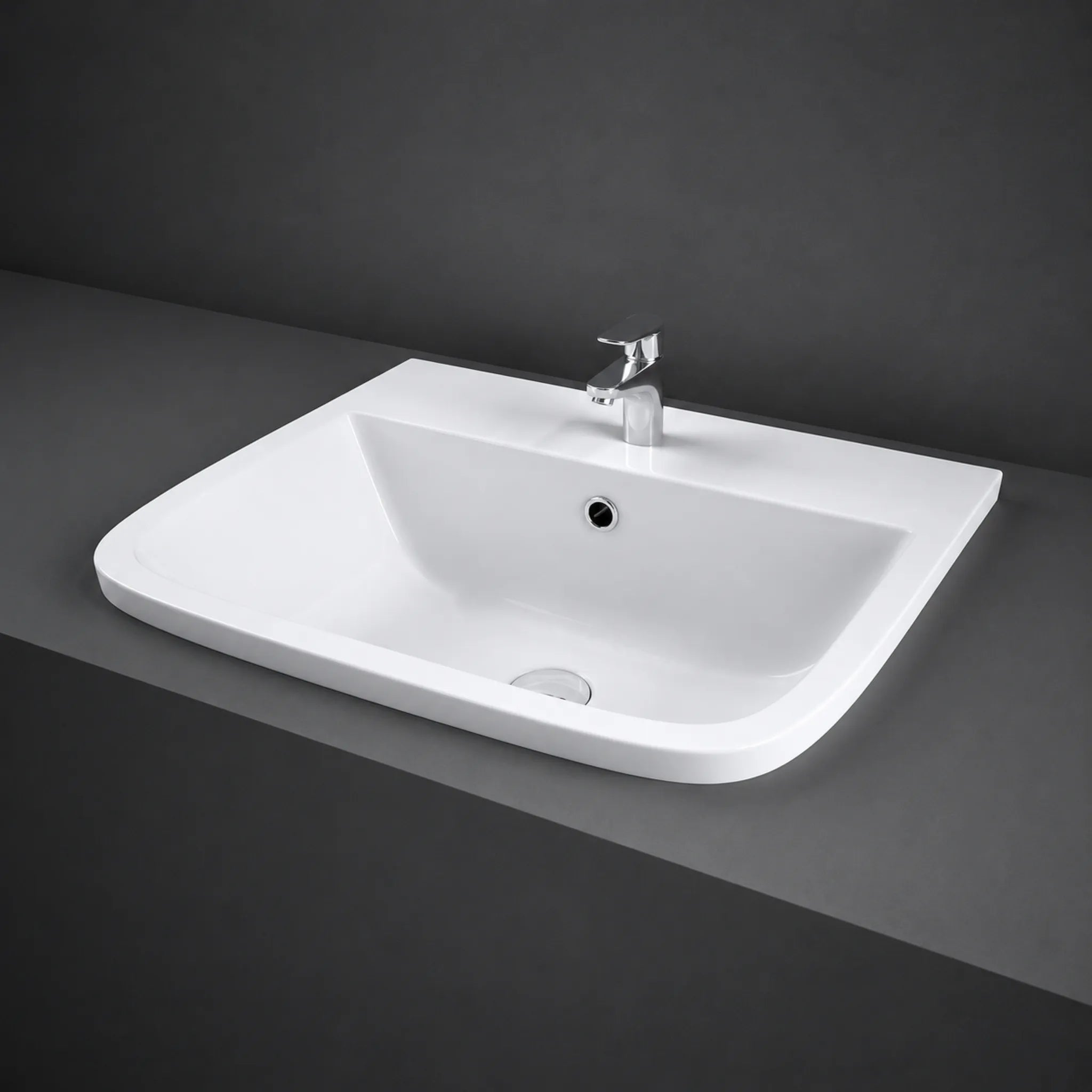 RAK Series 600 50cm white inset vanity basin showcasing a modern square shape, pre-drilled single tap hole, and integrated overflow.