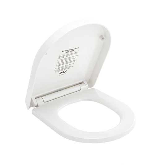 RAK Ceramics Resort series round urea toilet seat cover in white, opened view from a side angle to showcase its clean, ergonomic design.