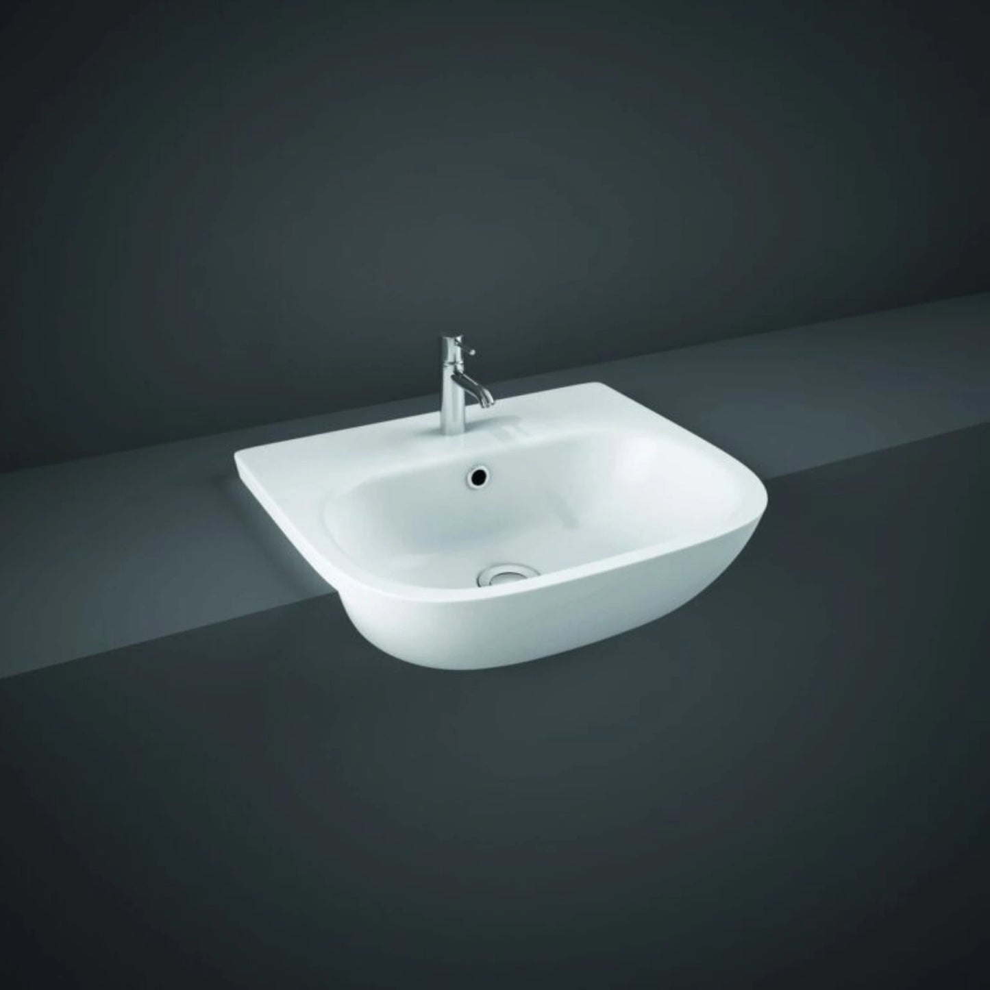 Front view of the 52cm RAK Ceramics Tonique semi-recessed rectangular wash basin in Alpine White, displaying its pre-drilled single central tap hole and integrated overflow.