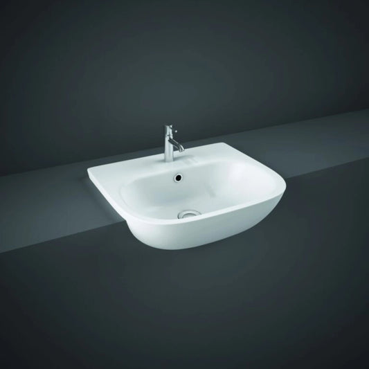 Front view of the 52cm RAK Ceramics Tonique semi-recessed rectangular wash basin in Alpine White, displaying its pre-drilled single central tap hole and integrated overflow.