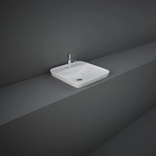 RAK-Variant 42cm squared drop-in wash basin in glossy Alpine White, showing its recessed profile and integrated single tap hole ledge.