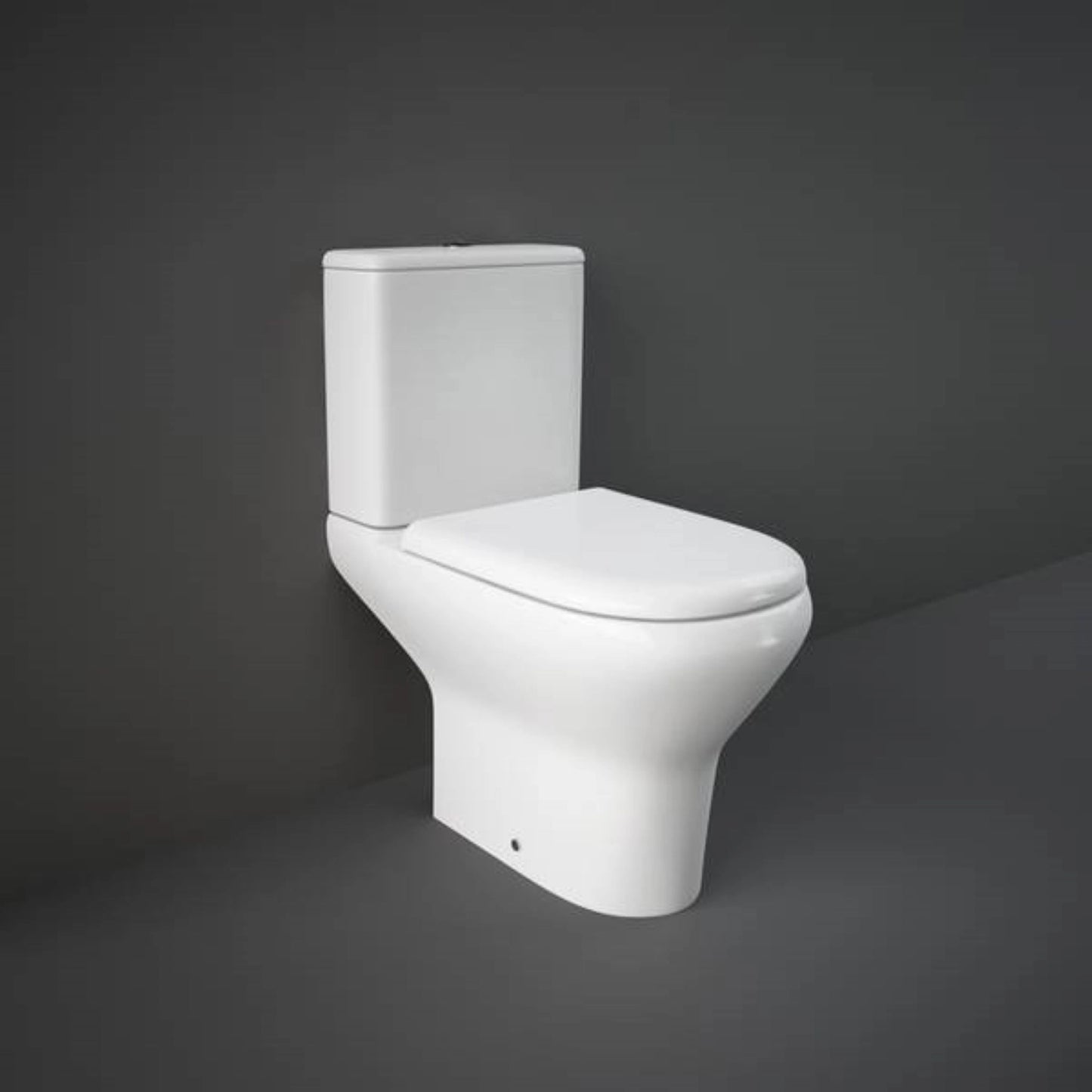 RAK Ceramics Compact close-coupled S-Trap toilet pan in Alpine White (CO03AWHA) featuring a classic round bowl and sleek back-open installation.