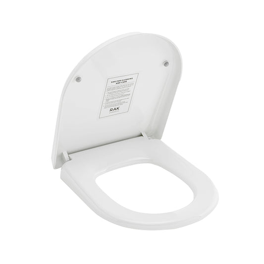High-quality RAK Ceramics Jumeirah oval toilet seat cover in Alpine White, featuring an open lid and soft-close ABS construction.