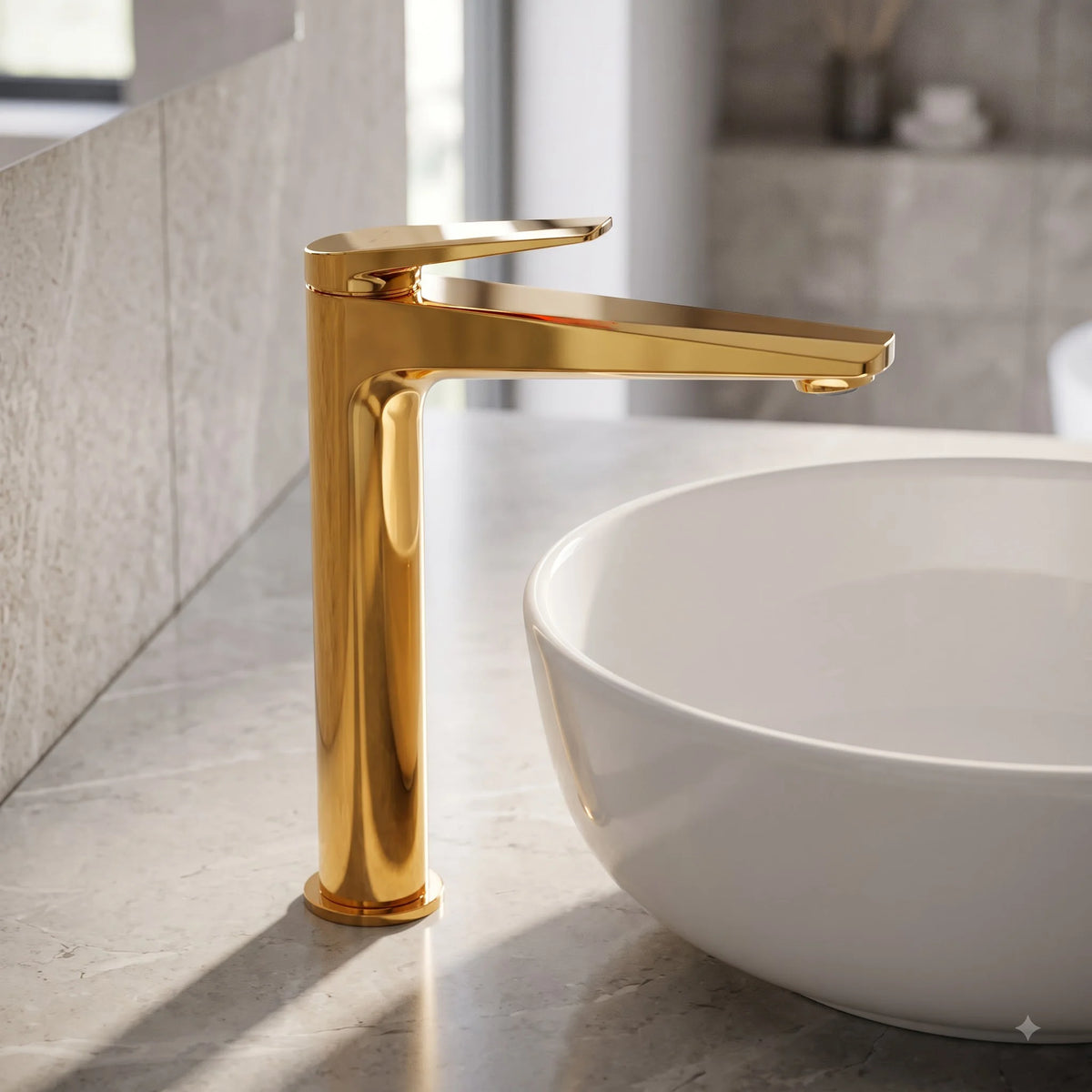 Sanitar Atri Series high polished gold washbasin mixer installed alongside a white countertop vessel bowl.