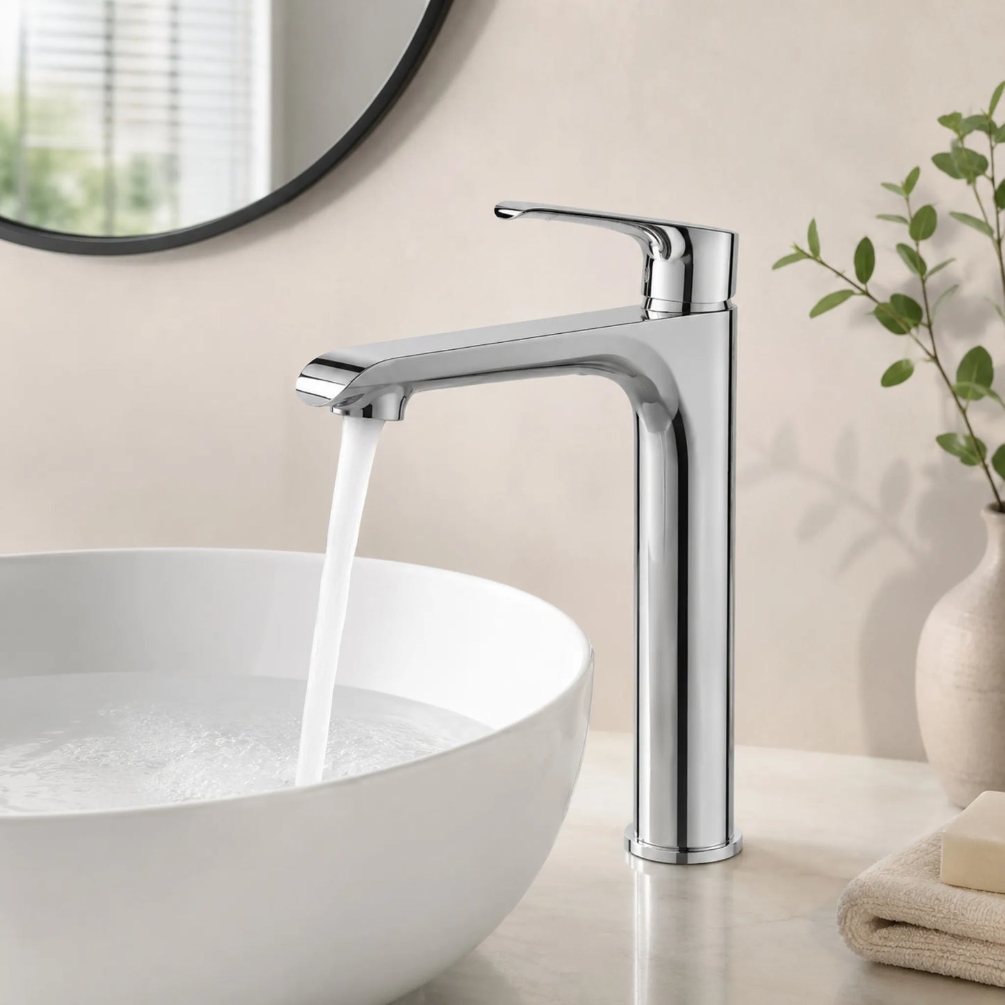 Modern chrome Jennet HWB high washbasin mixer faucet running water into a white ceramic vessel sink.