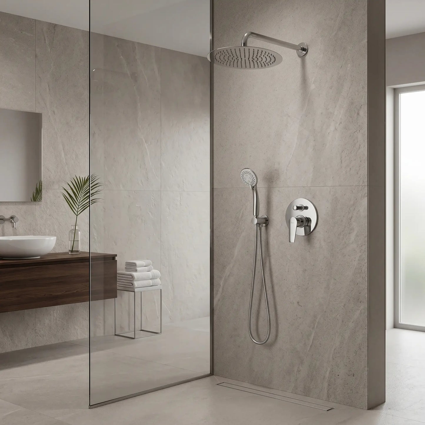 A contemporary minimalist bathroom showcasing the Strohm Teka Calvia concealed shower system installed on a stone-effect wall, featuring the circular overhead shower and wall-mounted mixer in a bright, airy walk-in shower space.